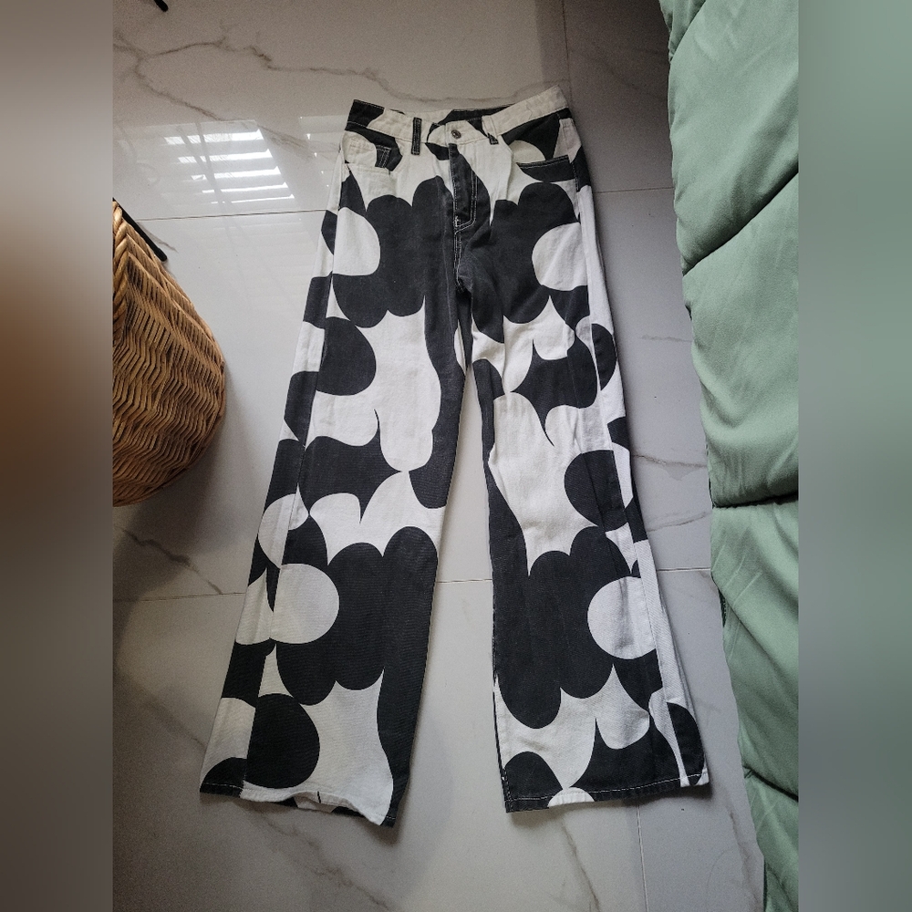 Black and white wide abstract pants jean material.